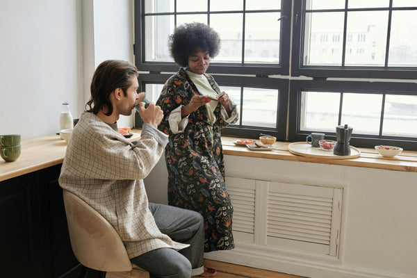 Couple sharing a morning coffee ritual β intentional everyday moments